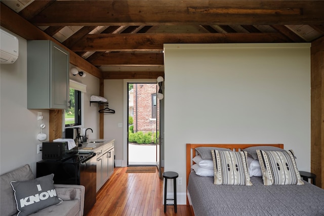 20 Paye Ave, Beacon, NY 12508 - kitchen with light wood-style floors, a wall unit AC, and wooden ceiling