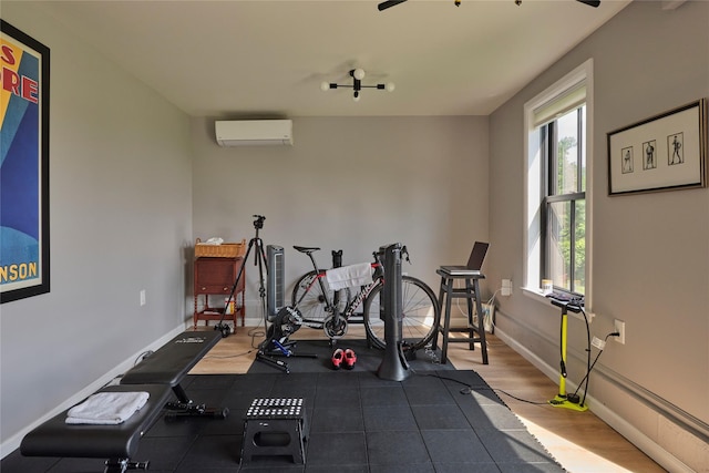 20 Paye Ave, Beacon, NY 12508 - exercise room featuring a wall mounted air conditioner and wood finished floors