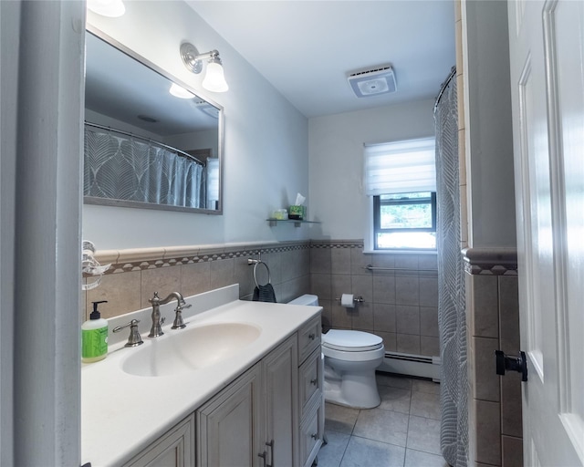 175 Chappaqua Rd, Briarcliff Manor, NY 10562 - bathroom featuring tile walls, a baseboard heating unit, tile patterned floors, vanity, and wainscoting