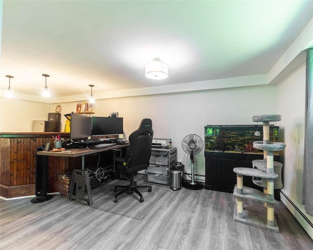 175 Chappaqua Rd, Briarcliff Manor, NY 10562 - office area with wood finished floors, a baseboard radiator, and a bar