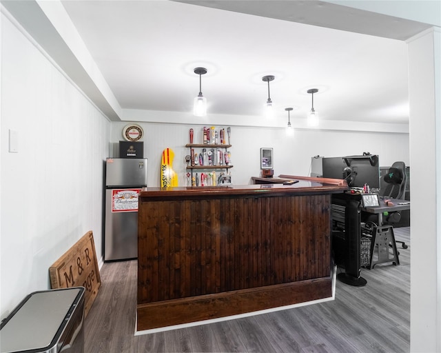 175 Chappaqua Rd, Briarcliff Manor, NY 10562 - indoor dry bar featuring stainless steel refrigerator, wood finished floors, and decorative light fixtures