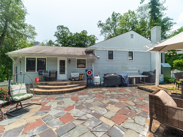 175 Chappaqua Rd, Briarcliff Manor, NY 10562 - rear view of property with a chimney, a porch, and a patio area