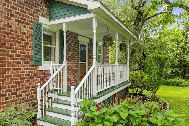 342-344 Van Wagner Rd, Poughkeepsie, NY 12603 - view of exterior entry with a porch and brick siding