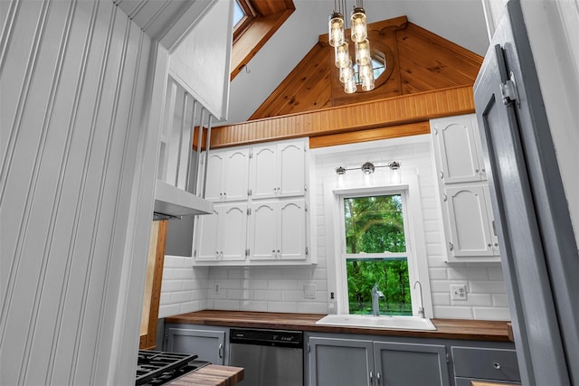 342-344 Van Wagner Rd, Poughkeepsie, NY 12603 - kitchen with wood counters, stainless steel dishwasher, decorative backsplash, and white cabinets