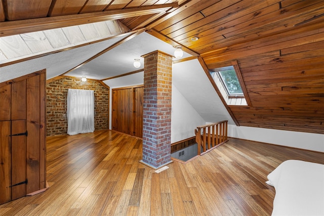 342-344 Van Wagner Rd, Poughkeepsie, NY 12603 - bonus room featuring a skylight, hardwood / wood-style flooring, brick wall, decorative columns, and wooden ceiling