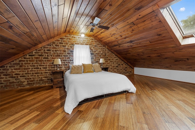 342-344 Van Wagner Rd, Poughkeepsie, NY 12603 - bedroom with brick wall, wooden ceiling, vaulted ceiling, hardwood / wood-style flooring, and a skylight