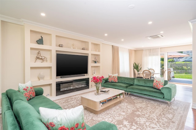 79 Fern St, New Rochelle, NY 10801 - living area with crown molding, wood finished floors, recessed lighting, and built in features