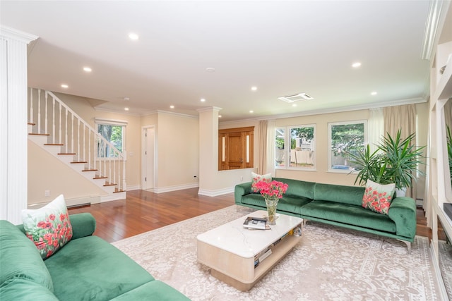 79 Fern St, New Rochelle, NY 10801 - living area featuring wood finished floors, stairway, recessed lighting, and ornamental molding