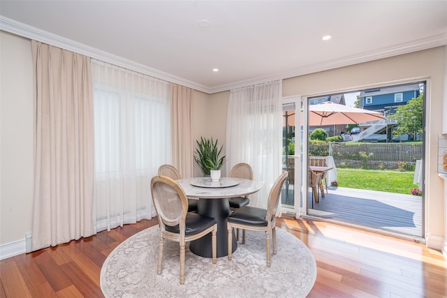 79 Fern St, New Rochelle, NY 10801 - dining space featuring crown molding, wood finished floors, and recessed lighting