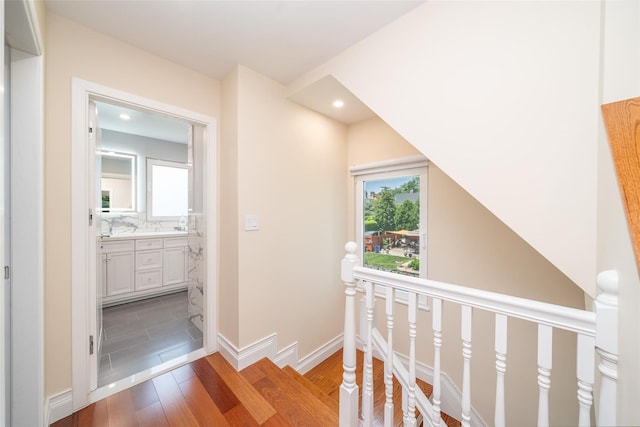 79 Fern St, New Rochelle, NY 10801 - hall with light wood-style flooring, an upstairs landing, and recessed lighting