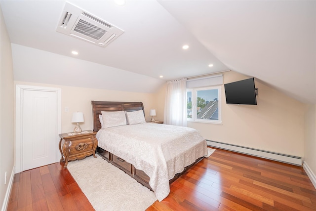 79 Fern St, New Rochelle, NY 10801 - bedroom featuring a baseboard radiator, hardwood / wood-style floors, vaulted ceiling, and recessed lighting