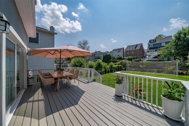 79 Fern St, New Rochelle, NY 10801 - wooden terrace featuring a residential view, outdoor dining space, and a fenced backyard