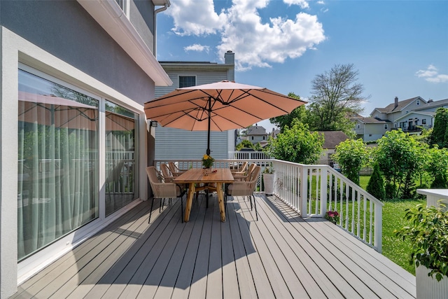 79 Fern St, New Rochelle, NY 10801 - wooden deck featuring outdoor dining space and a residential view