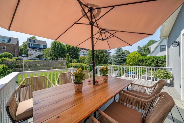 79 Fern St, New Rochelle, NY 10801 - wooden terrace with outdoor dining area