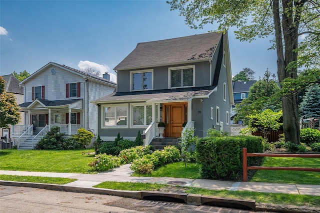79 Fern St, New Rochelle, NY 10801 - view of front facade with stucco siding, a shingled roof, and a porch