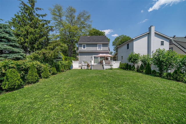 79 Fern St, New Rochelle, NY 10801 - back of property with a wooden deck