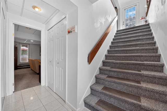 11 Beverly Ln, Peekskill, NY 10566 - staircase with carpet floors and tile patterned flooring