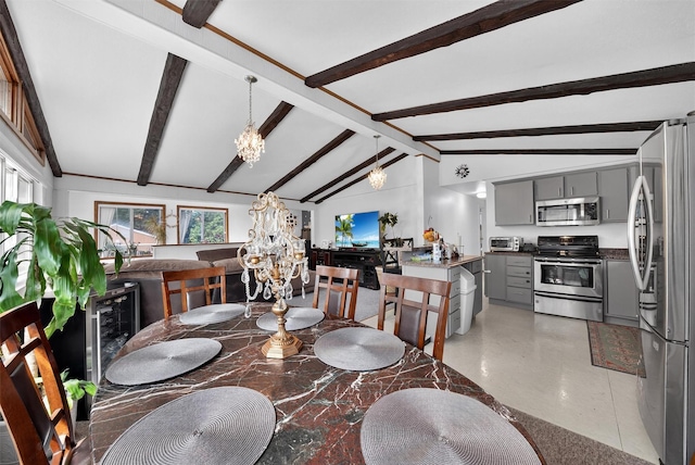 11 Beverly Ln, Peekskill, NY 10566 - dining space with a chandelier and wine cooler
