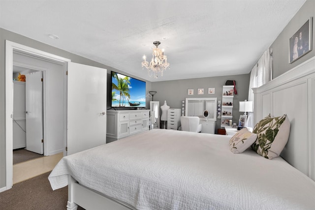 11 Beverly Ln, Peekskill, NY 10566 - carpeted bedroom featuring a chandelier and baseboards