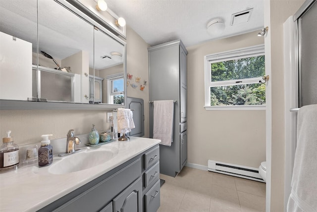 11 Beverly Ln, Peekskill, NY 10566 - full bathroom with a baseboard radiator, vanity, a shower stall, tile patterned flooring, and a textured ceiling