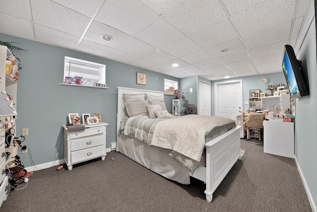 11 Beverly Ln, Peekskill, NY 10566 - bedroom featuring dark colored carpet, a drop ceiling, a closet, and recessed lighting
