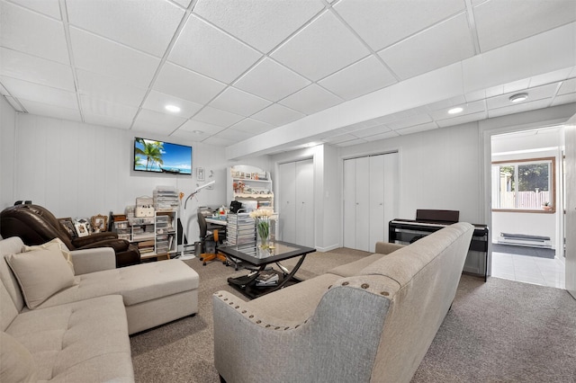 11 Beverly Ln, Peekskill, NY 10566 - living room featuring a drop ceiling, a baseboard radiator, carpet flooring, and recessed lighting