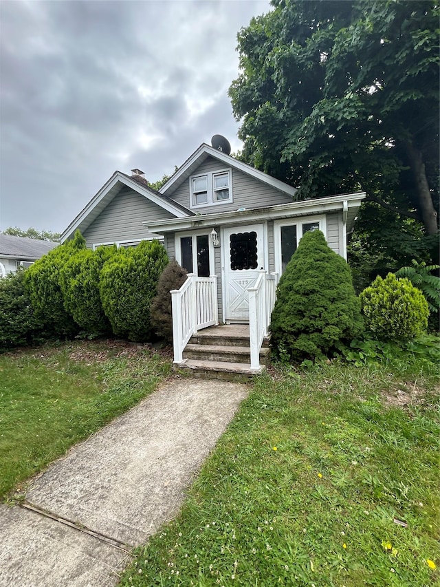 176 Sweezy Ave, Freeport, NY 11520 - bungalow with a front yard