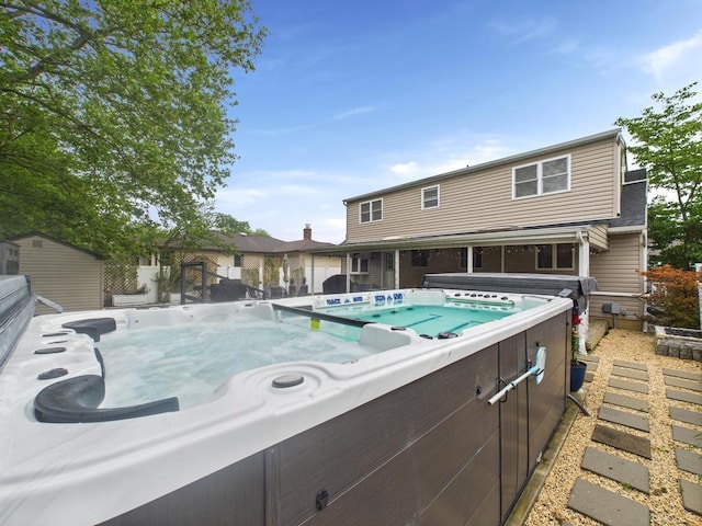 260 9th St, Bethpage, NY 11714 - rear view of house with a hot tub