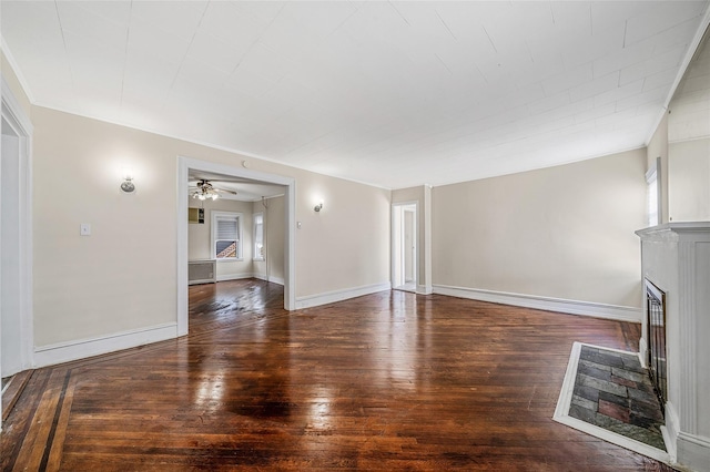 10 Leach St, Lynbrook, NY 11563 - unfurnished living room with a glass covered fireplace and hardwood / wood-style flooring