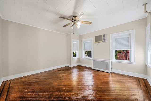 10 Leach St, Lynbrook, NY 11563 - spare room featuring radiator, a wall mounted air conditioner, hardwood / wood-style flooring, ceiling fan, and crown molding