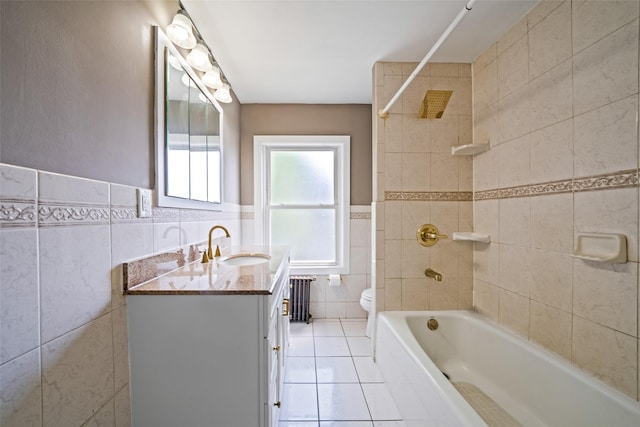 10 Leach St, Lynbrook, NY 11563 - full bathroom with tile walls, tile patterned floors, radiator, vanity, and wainscoting