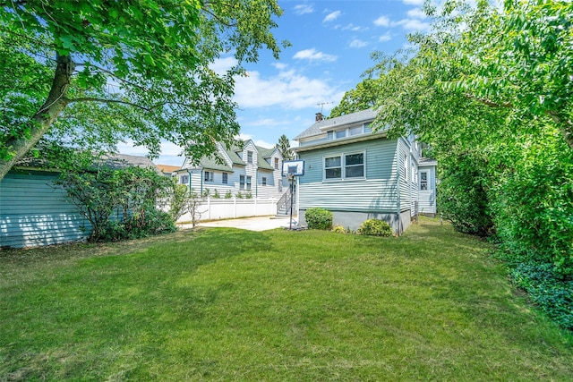 10 Leach St, Lynbrook, NY 11563 - back of property with a chimney