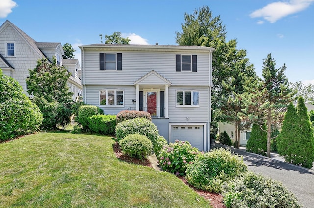 34 Winter Hill Rd, Tuckahoe, NY 10707 - colonial house featuring an attached garage, driveway, and a front yard