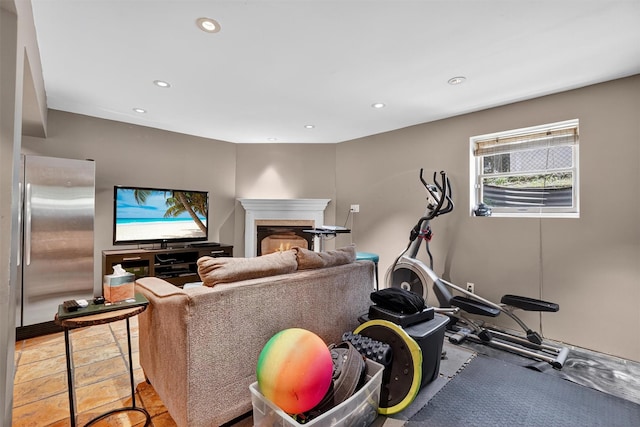 34 Winter Hill Rd, Tuckahoe, NY 10707 - workout area with recessed lighting and a warm lit fireplace