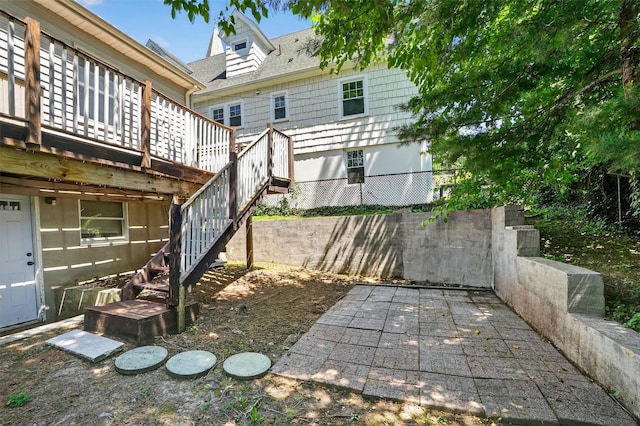 34 Winter Hill Rd, Tuckahoe, NY 10707 - rear view of house with a wooden deck, roof with shingles, a patio, and stairway