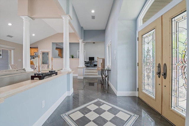 8 Kilmer Ave, Dix Hills, NY 11746 - foyer entrance featuring ornate columns, granite tiled floors, recessed lighting, and vaulted ceiling