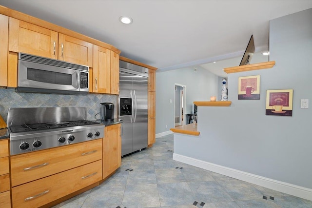 8 Kilmer Ave, Dix Hills, NY 11746 - kitchen with stainless steel appliances, tasteful backsplash, dark countertops, recessed lighting, and light brown cabinets