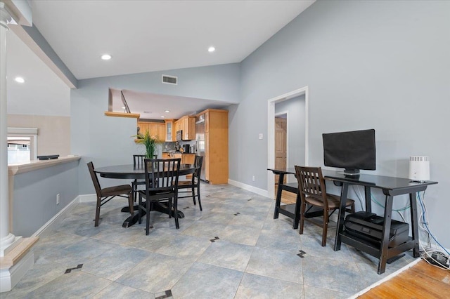 8 Kilmer Ave, Dix Hills, NY 11746 - dining area featuring vaulted ceiling and recessed lighting