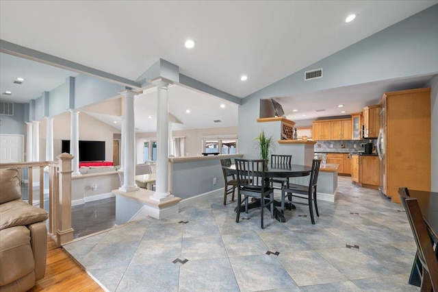 8 Kilmer Ave, Dix Hills, NY 11746 - dining room featuring decorative columns, lofted ceiling, and recessed lighting