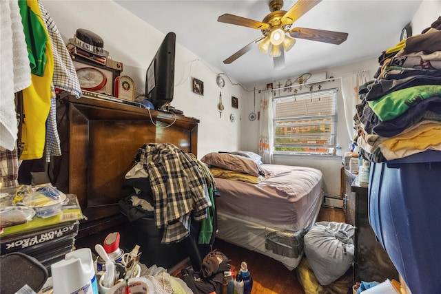 1112 Saint Lawrence Ave Front, Front, Bronx, NY 10472 - bedroom with ceiling fan, baseboard heating, and wood finished floors