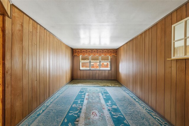 1112 Saint Lawrence Ave Front, Front, Bronx, NY 10472 - carpeted spare room featuring wood walls