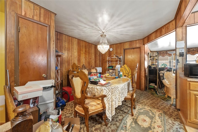 1112 Saint Lawrence Ave Front, Front, Bronx, NY 10472 - dining area featuring wood walls and a chandelier