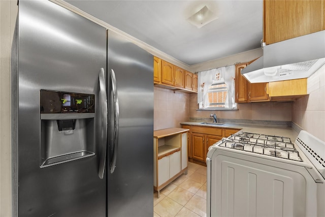 1112 Saint Lawrence Ave Front, Front, Bronx, NY 10472 - kitchen featuring stainless steel refrigerator with ice dispenser, white range with gas cooktop, tasteful backsplash, light tile patterned flooring, and extractor fan
