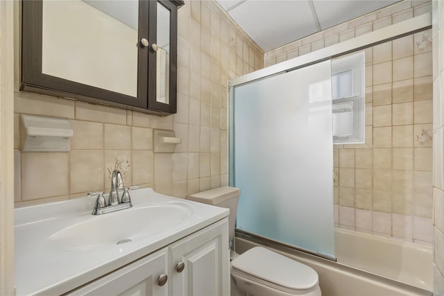 1112 Saint Lawrence Ave Front, Front, Bronx, NY 10472 - bathroom with combined bath / shower with glass door, vanity, tile walls, and tasteful backsplash