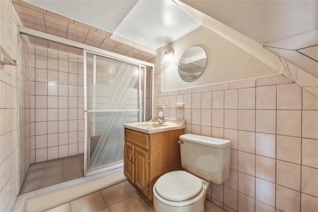 1112 Saint Lawrence Ave Front, Front, Bronx, NY 10472 - full bath featuring vanity, a shower stall, tile walls, and tile patterned flooring