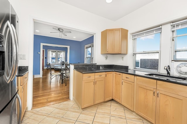 22 King Ave, Yonkers, NY 10704 - kitchen featuring stainless steel refrigerator with ice dispenser, light brown cabinetry, plenty of natural light, and recessed lighting