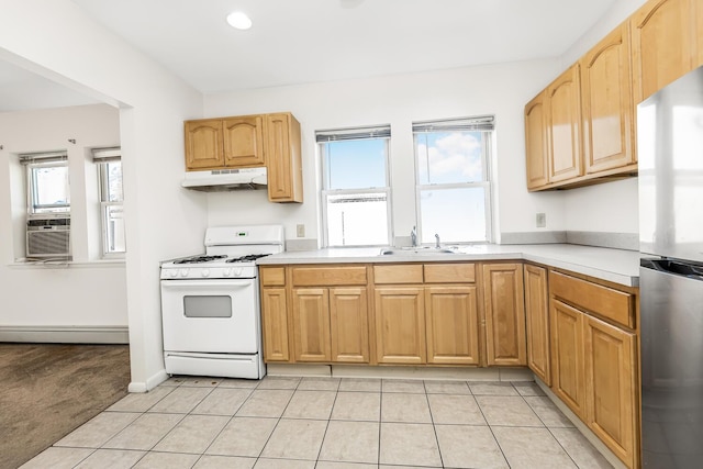 22 King Ave, Yonkers, NY 10704 - kitchen featuring white gas range, under cabinet range hood, a baseboard heating unit, freestanding refrigerator, and cooling unit