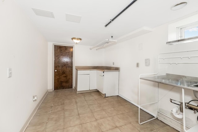 22 King Ave, Yonkers, NY 10704 - laundry room featuring baseboards