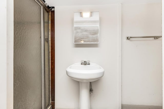 22 King Ave, Yonkers, NY 10704 - bathroom with a stall shower and a sink