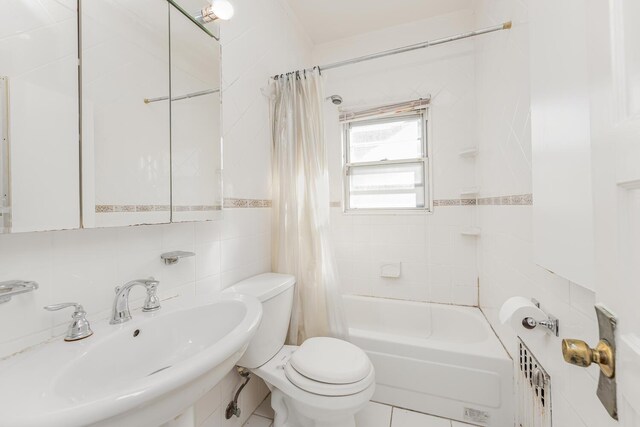 22 King Ave, Yonkers, NY 10704 - bathroom with shower / tub combo with curtain and tile walls
